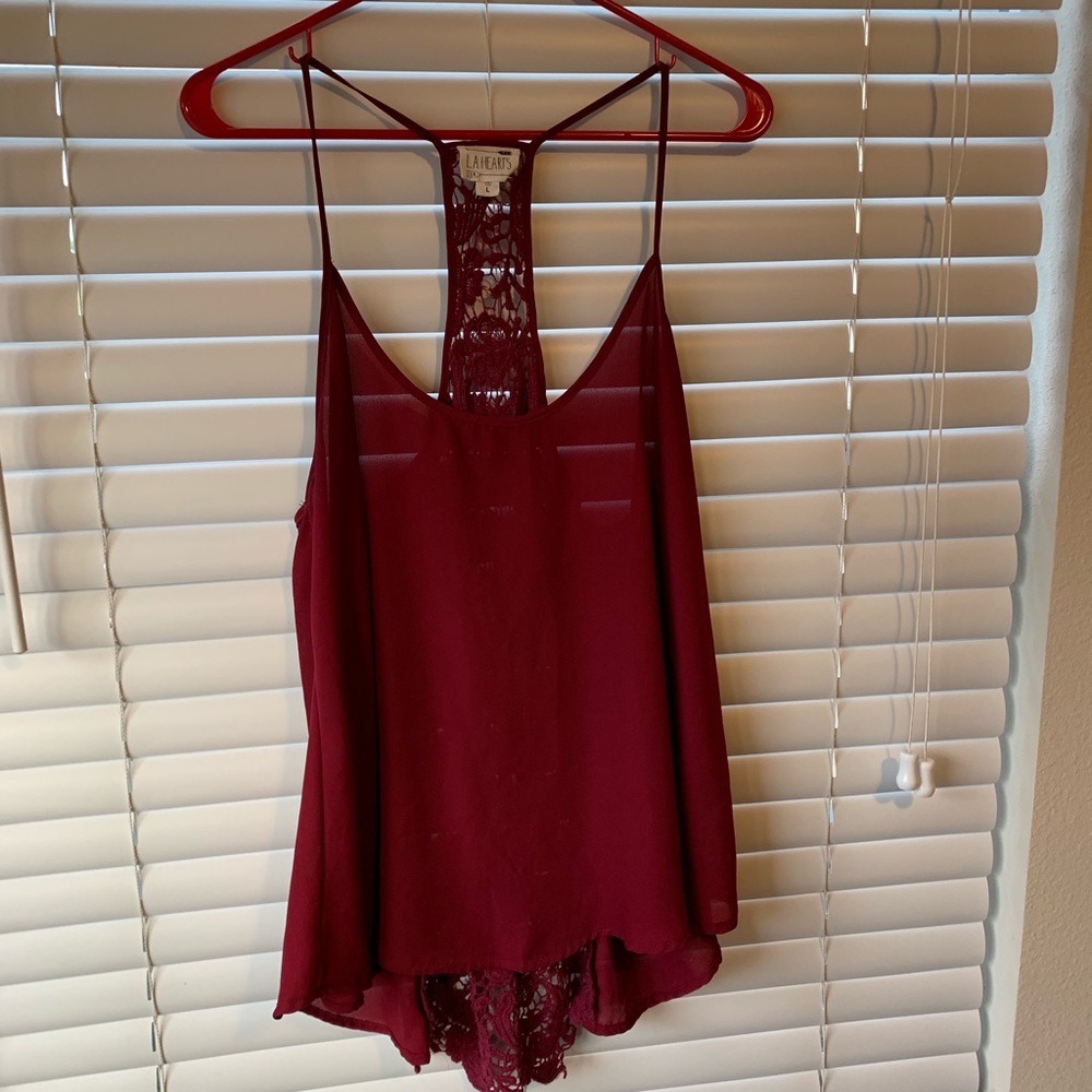 maroon tank top. lace detail in back.
